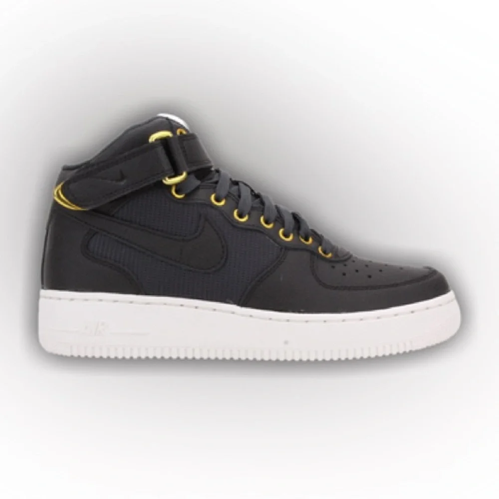 Nike Air Force ones black high top sneakers gold trim